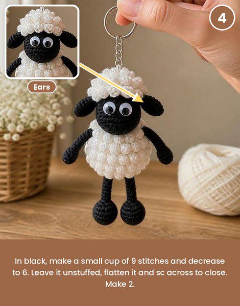 Round white bobble body of the amigurumi sheep.